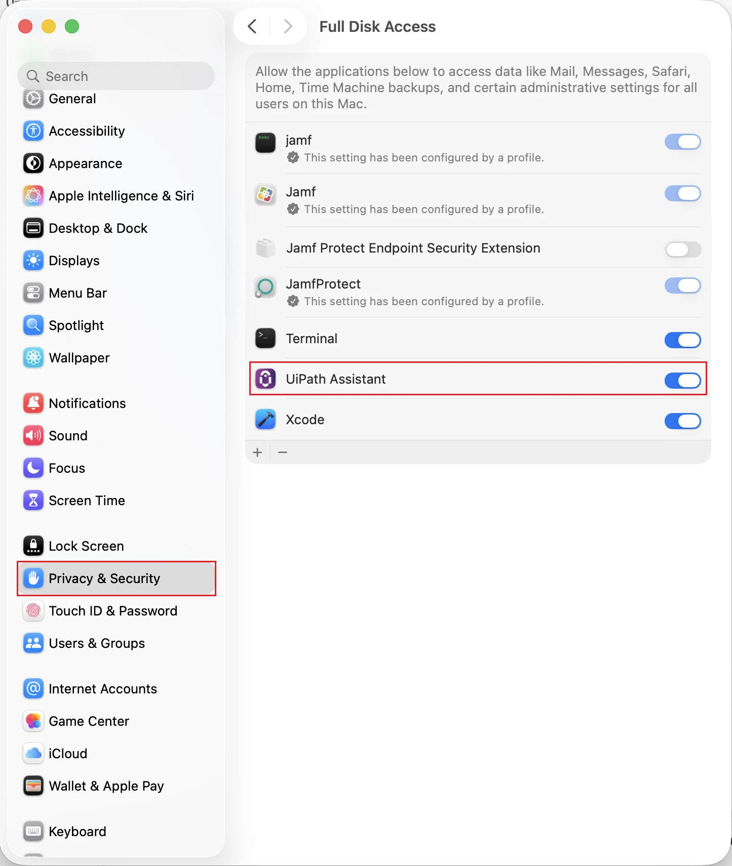 macOS Privacy & Security settings showing the Full Disk Access pane with UiPath Assistant in the list of applications