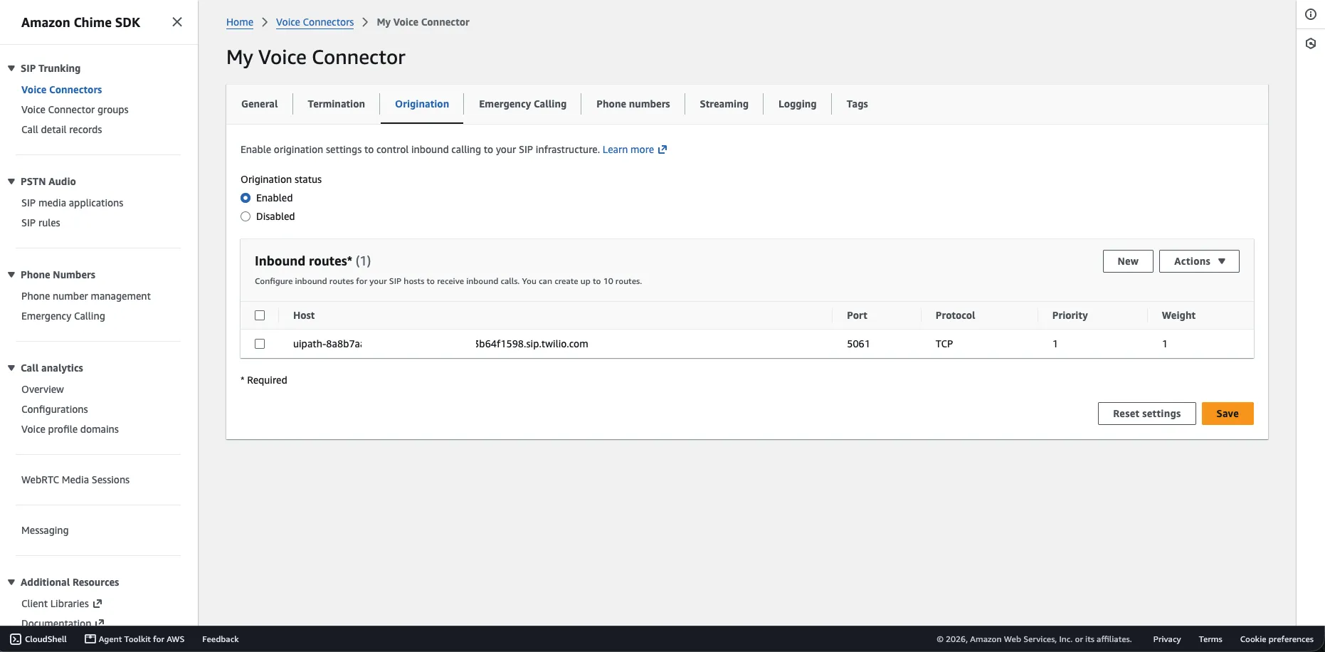 The Origination tab of a Voice Connector, with origination enabled and an inbound route whose host is the UiPath SIP domain, port 5061, and priority and weight set to 1